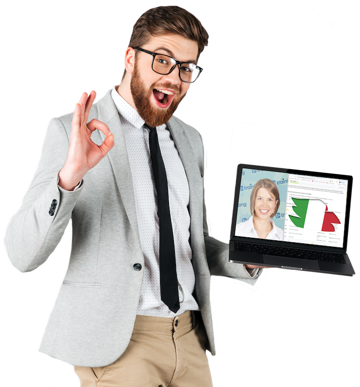 cursos para aprender ITALIANO estudiar online hombre pelirrojo haciendo skype por ordenador